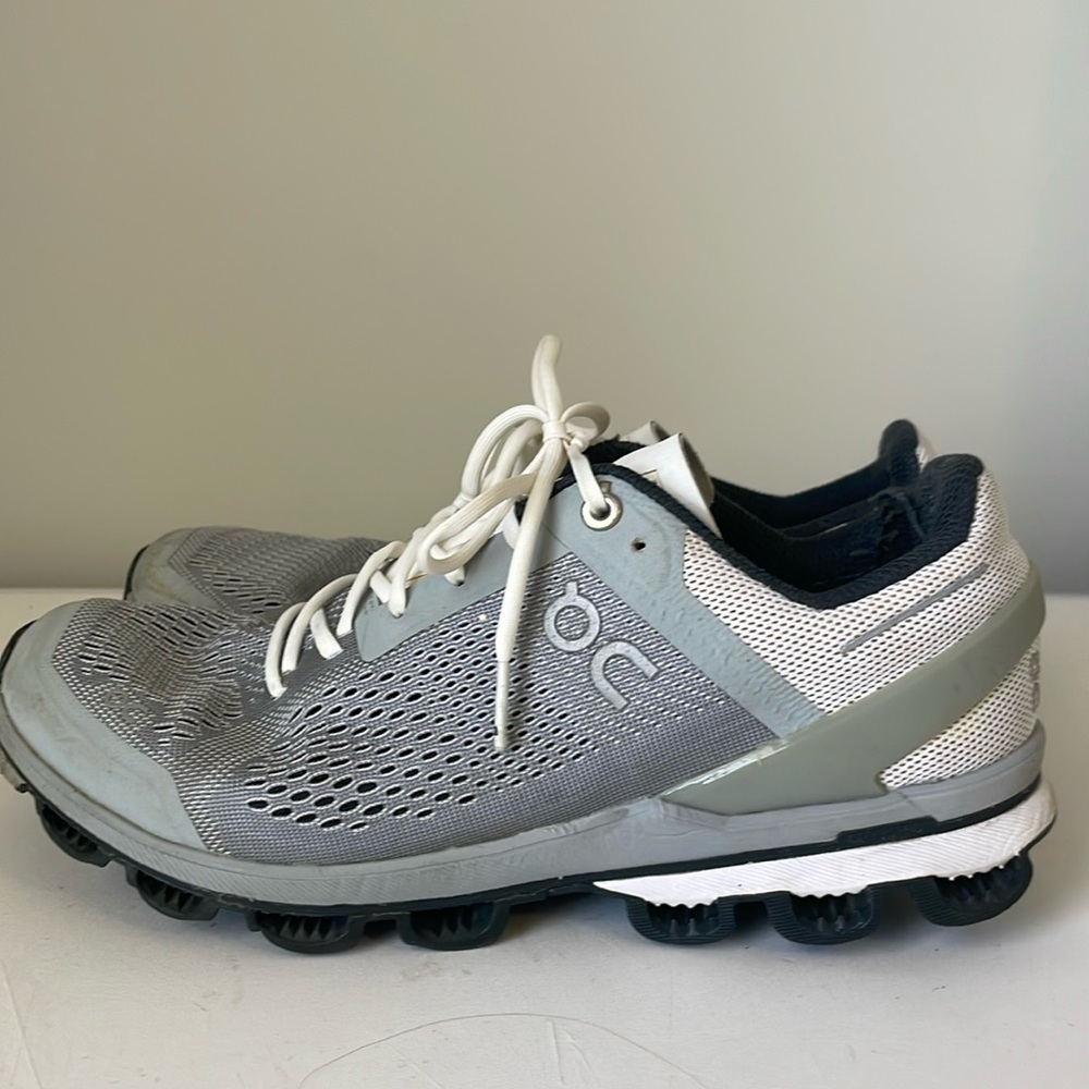 On Running Gray and White Athletic Shoes